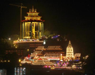 Magnificent: The 30.2m-high bronze statue of the Goddess of Mercy adds grandeur to the Kek Lok Si temple in Air Itam.