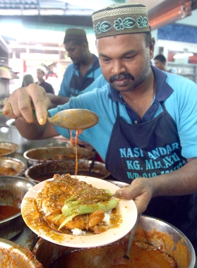 Popular: Nasi kandar Kampung Melayu is easily the country’s best.