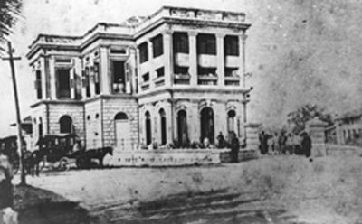 <b>Landmark:</b> Wisma Gama was once the site of the old police station and<br />
gunpowder magazine. —Photo courtesy of Penang Public Library” width=”400″ height=”248″ /><br />
<span class=