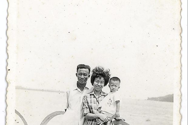 Fun times: (Clockwise from left) The writer at two with his mother Yeoh Poh Choo and father Wong Soon Cheong at Batu Maung.