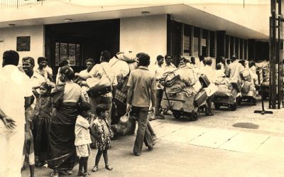 Making their way through: Passengers at the Customs checkpoint at Swettenham Pier in 1975.