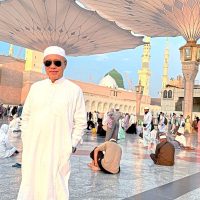 Wong Chun Wai outside the Prophet's Mosque in Medina, Saudi Arabia. Medina was previously closed to non-Muslims.